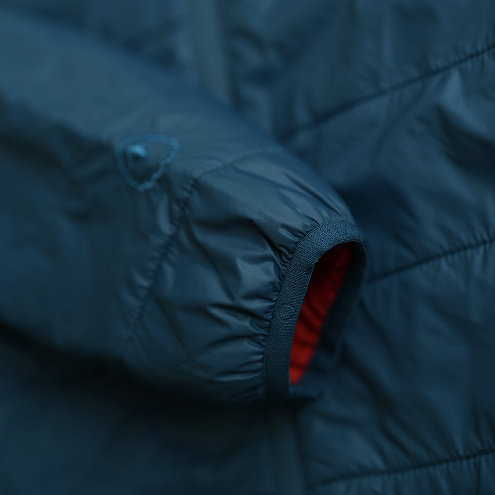 Isobaa | Mens Packable Insulated Jacket (Petrol/Orange) | Exceptional warmth, packable convenience, and sustainable design with our lightweight Merino wool jacket.