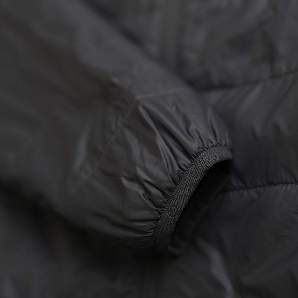 Isobaa | Mens Packable Insulated Jacket (Smoke/Black) | Exceptional warmth, packable convenience, and sustainable design with our lightweight Merino wool jacket.