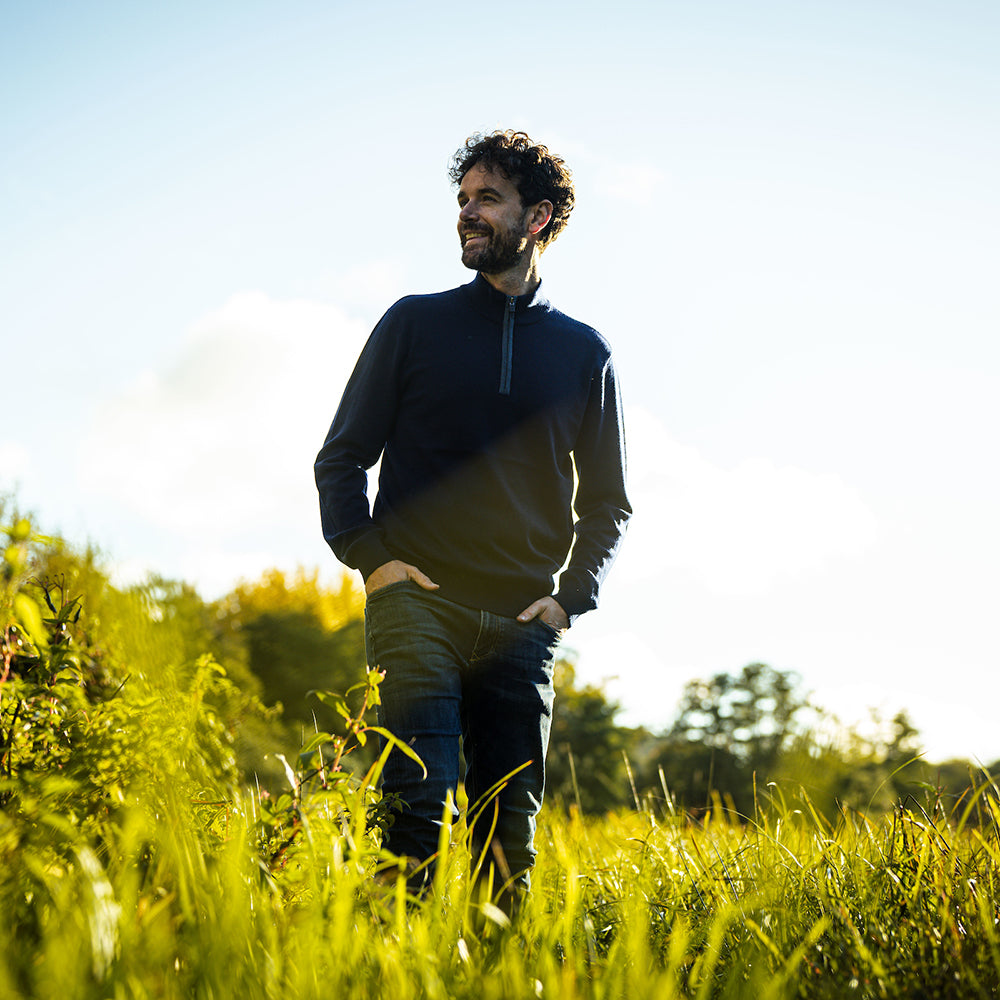 Isobaa | Mens Zip Neck Sweater (Navy/Denim) | Experience premium comfort, and refined style with our Merino wool zip-neck sweater. | Model: Leighton