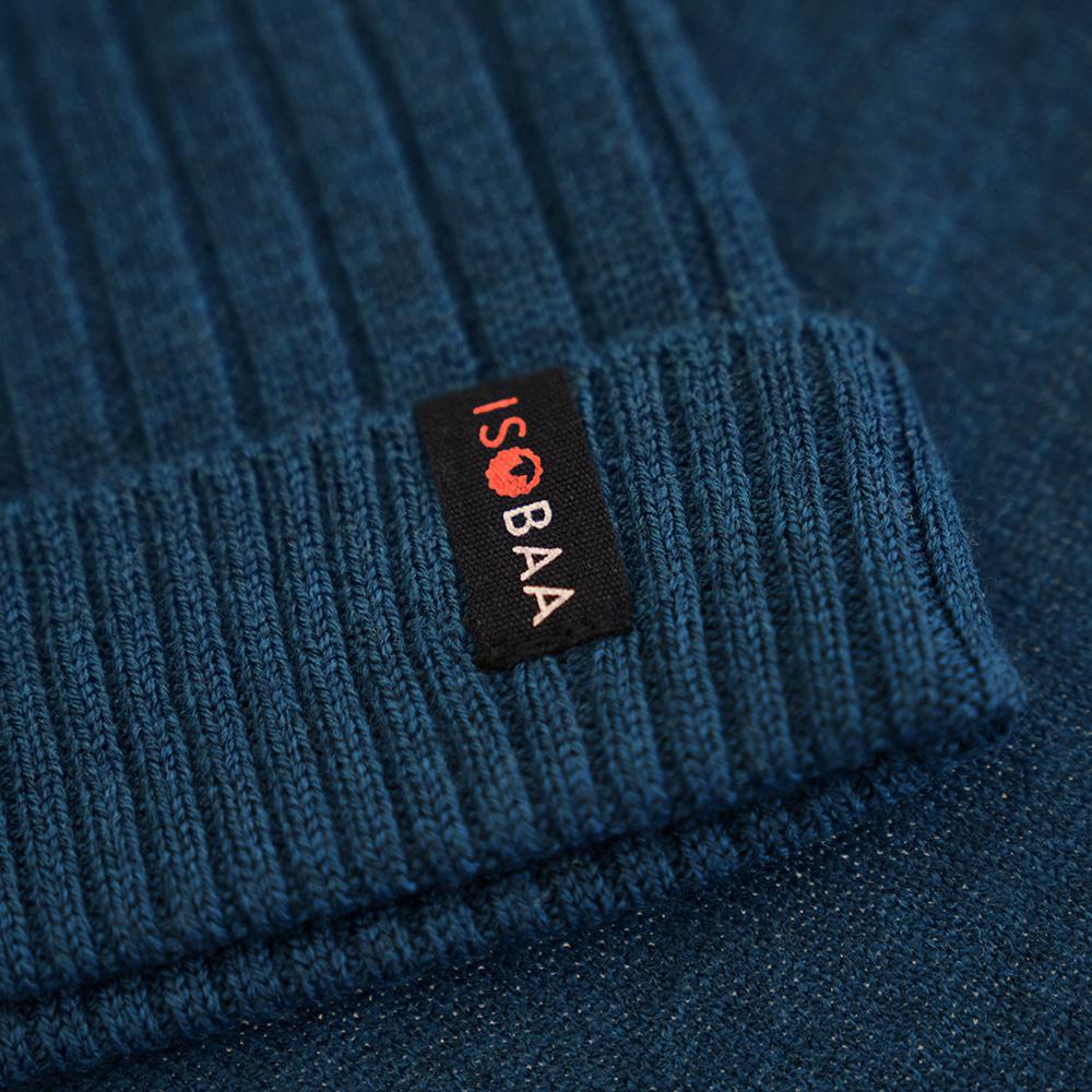 Isobaa | Merino Bobble Beanie (Petrol) | Stay warm and stylish with Isobaa's extra-fine Merino bobble beanie! Its cosy warmth, playful bobble, and classic rib-knit design will make it your go-to winter essential for hikes, city strolls, and everything in between.