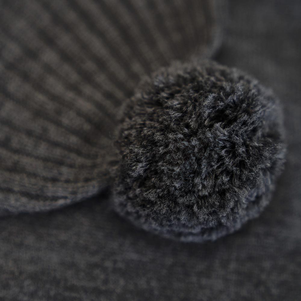 Isobaa | Merino Bobble Beanie (Smoke) | Stay warm and stylish with Isobaa's extra-fine Merino bobble beanie! Its cosy warmth, playful bobble, and classic rib-knit design will make it your go-to winter essential for hikes, city strolls, and everything in between.