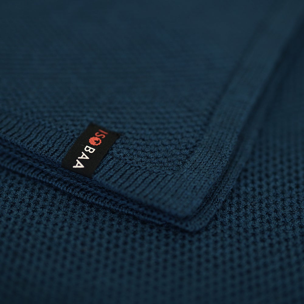 Isobaa | Merino Honeycomb Shawl (Petrol) | Chase away the chill in style with Isobaa's extra-fine Merino shawl.