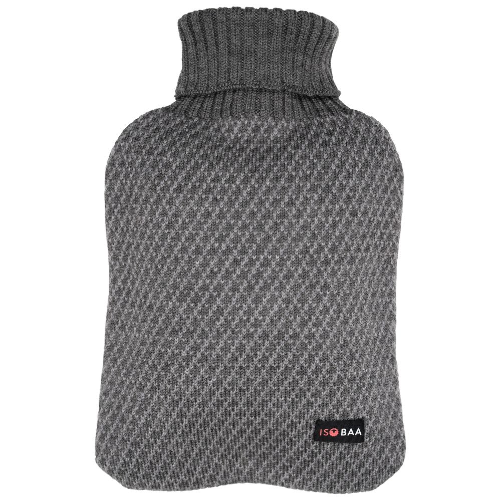 Isobaa | Merino Jacquard Hot Water Bottle Cover (Charcoal/Smoke) | Say goodbye to ordinary hot water bottles! You'll love the luxurious feel of our Merino wool cover – and your skin will thank you! Wrap yourself in cosy warmth, enjoy natural breathability, and discover the ultimate hot water bottle indulgence.