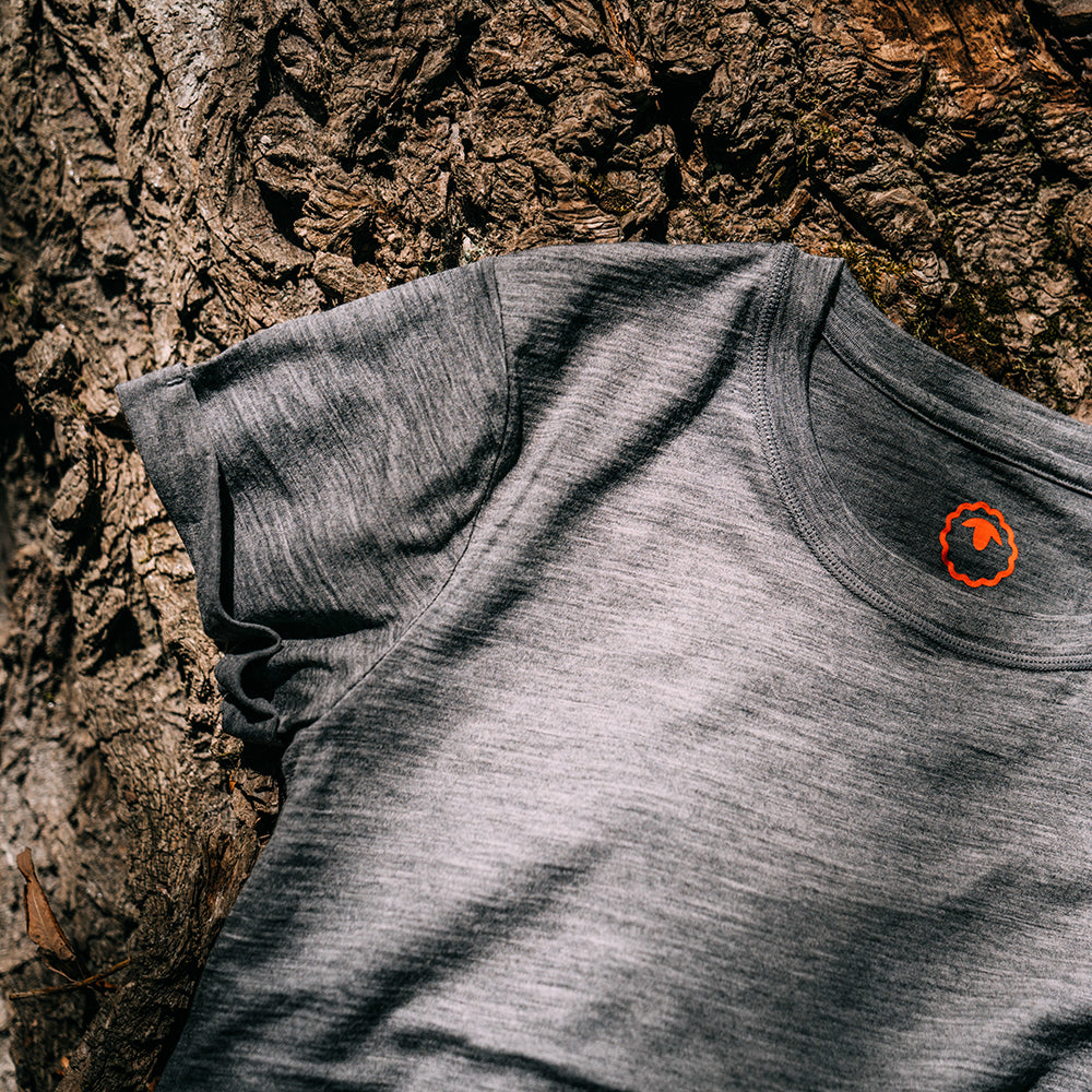 Isobaa | Womens Merino 150 Roll Sleeve Tee (Charcoal) | Our superfine Merino T-shirt performs everywhere from outdoor adventures to coffee dates.