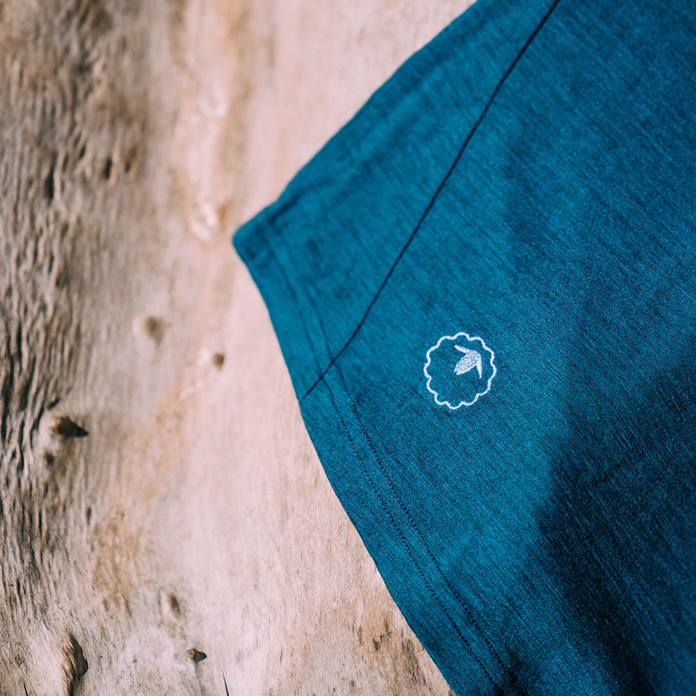 Isobaa | Womens Merino 150 Roll Sleeve Tee (Petrol) | Our superfine Merino T-shirt performs everywhere from outdoor adventures to coffee dates.