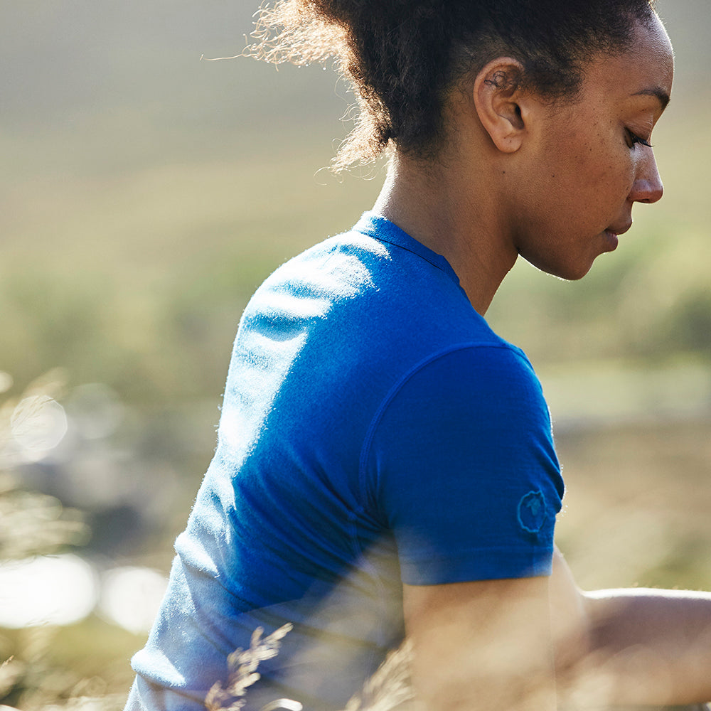 Isobaa | Womens Merino 150 Short Sleeve Crew (Blue) | Gear up for performance and comfort with Isobaa's technical Merino short-sleeved top. | Model: Savanah