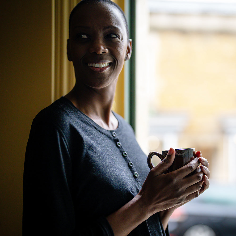 Isobaa | Womens Merino Blend 160 PJ Henley (Black Melange) | Embrace effortless comfort with Isobaa's Merino blend Henley. | Model: Yolisa