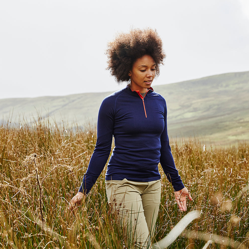 Isobaa | Womens Merino 200 Long Sleeve Zip Neck (Navy) | Experience the best of 200gm Merino wool with this ultimate half-zip top – your go-to for challenging hikes, chilly bike commutes, post-workout layering, and unpredictable weather. | Model: Savanah