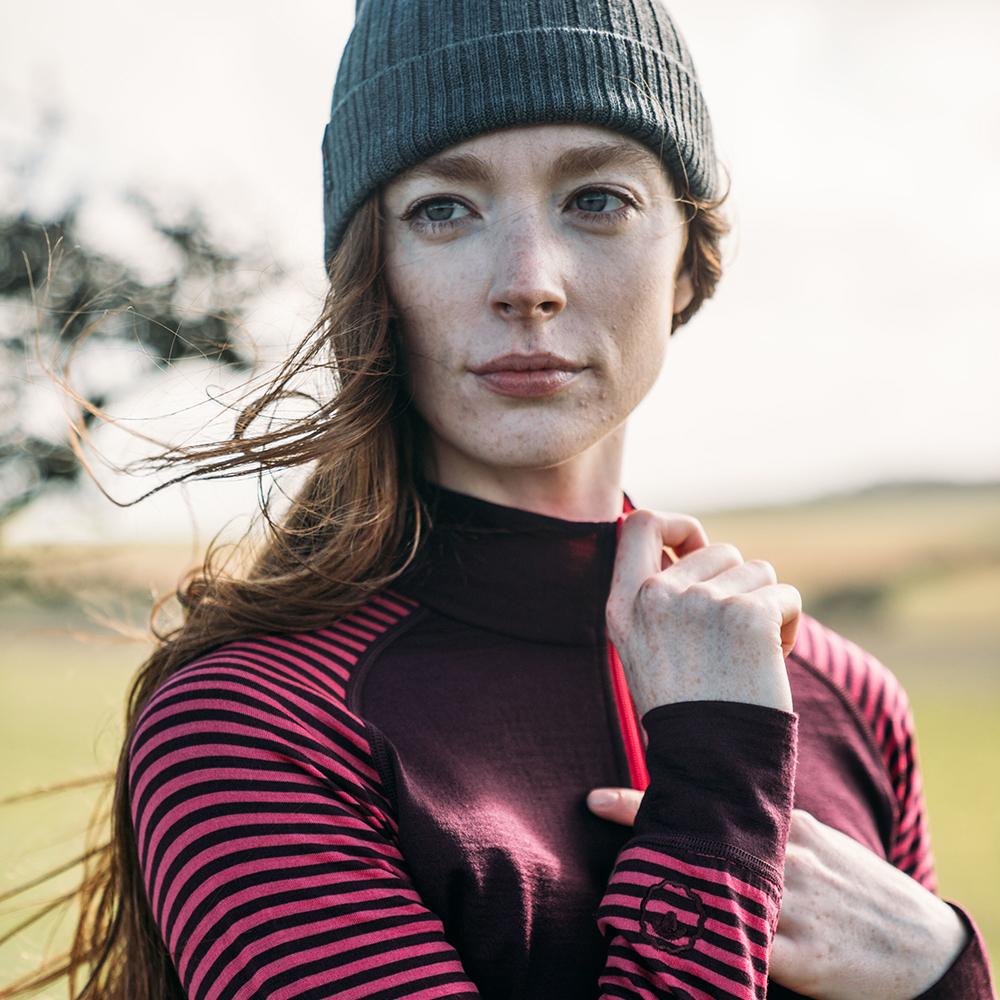 Isobaa | Womens Merino 200 Long Sleeve Zip Neck (Wine/Fuchsia) | Experience the best of 200gm Merino wool with this ultimate half-zip top – your go-to for challenging hikes, chilly bike commutes, post-workout layering, and unpredictable weather. | Model: Sophie