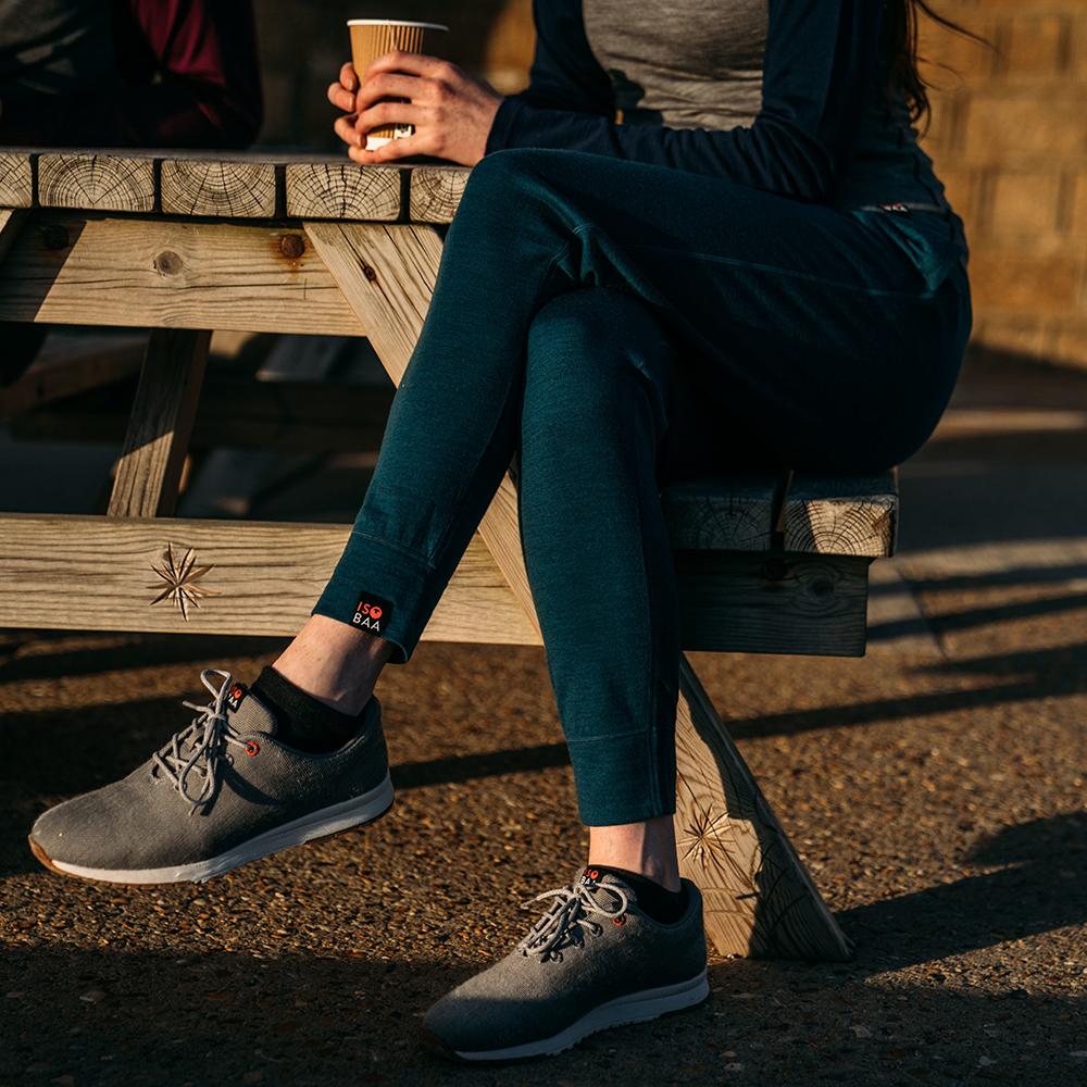 Isobaa | Womens Merino 260 Lounge Cuffed Joggers (Petrol/Lime) | Discover unparalleled comfort and versatility with our luxurious 260gm Merino wool lounge joggers. | Model: Sophie