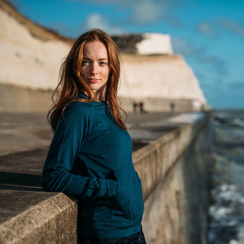 Isobaa | Womens Merino 260 Lounge Hoodie (Petrol/Lime) | Experience the best in comfort and performance with our midweight 260gm Merino wool pullover hoodie. | Model: Sophie