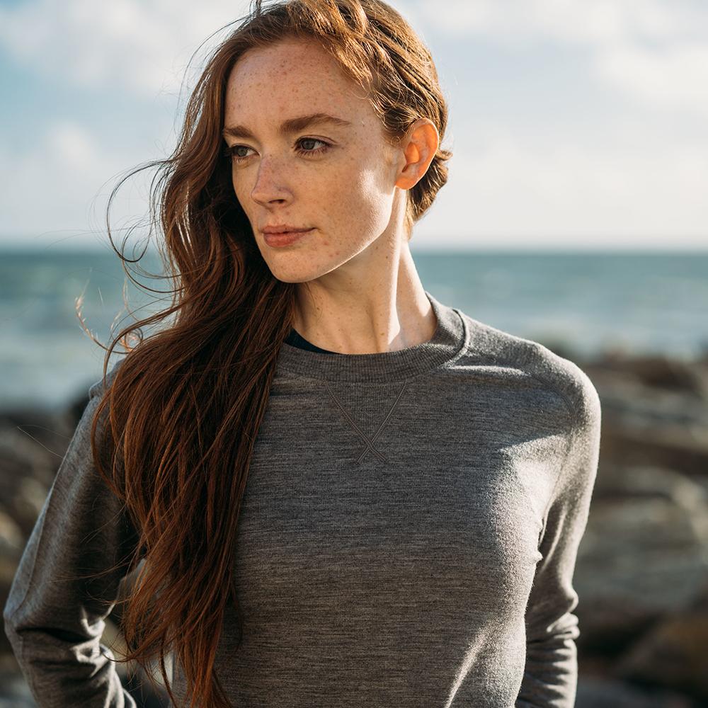 Isobaa | Womens Merino 260 Lounge Sweatshirt (Charcoal) | The ultimate 260gm Merino wool sweatshirt – Your go-to for staying cosy after chilly runs, conquering weekends in style, or whenever you crave warmth without bulk. | Model: Sophie