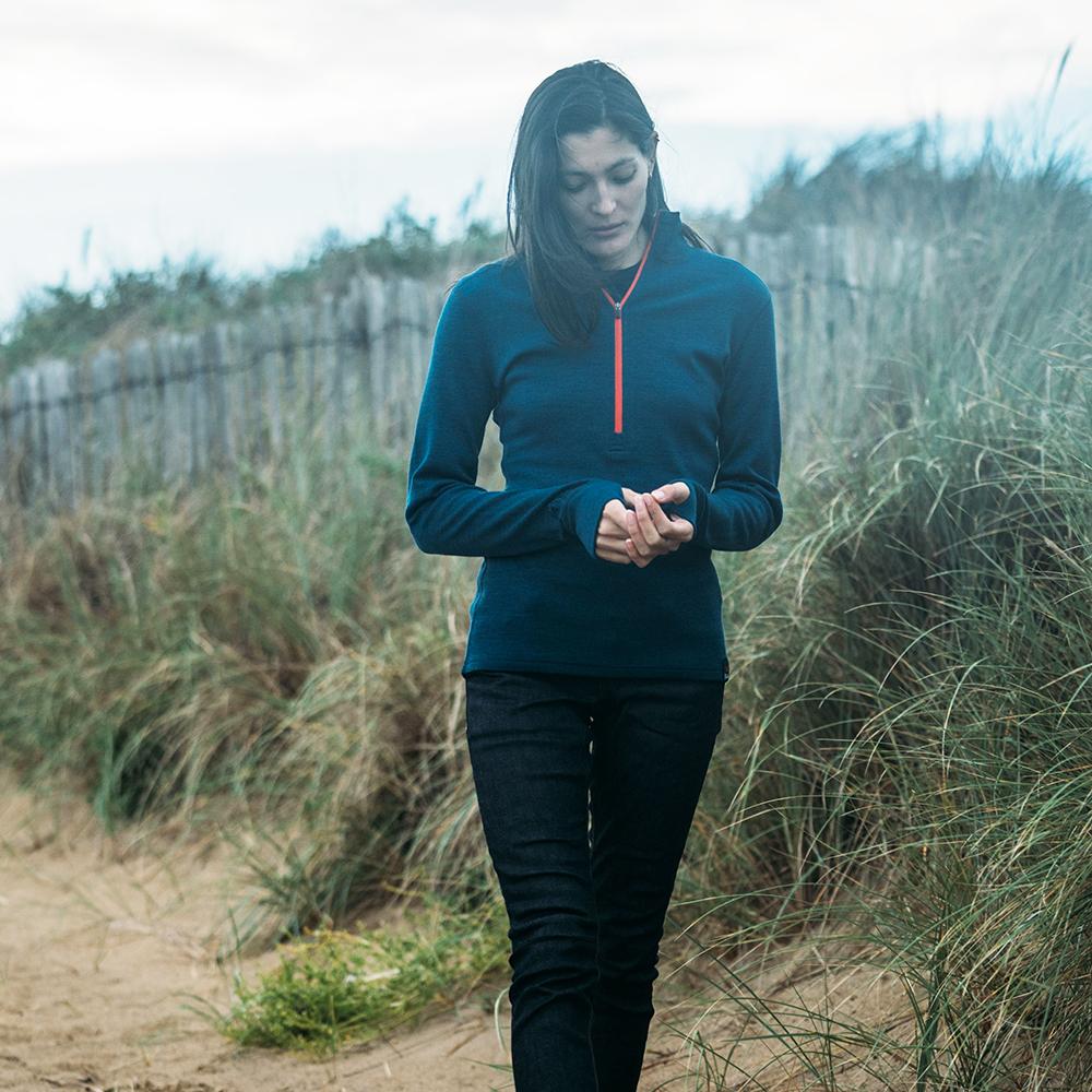 Isobaa | Womens Merino 320 Long Sleeve Half Zip (Petrol/Orange) | Conquer cold trails, blustery commutes, and unpredictable weather with the ultimate Merino wool half-zip top.