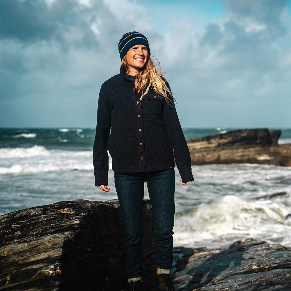 Isobaa | Womens Merino Blend Mountain Shirt (Smoke) | Conquer trails, peaks, and urban adventures with this high-performance Merino blend overshirt. | Model: Amy