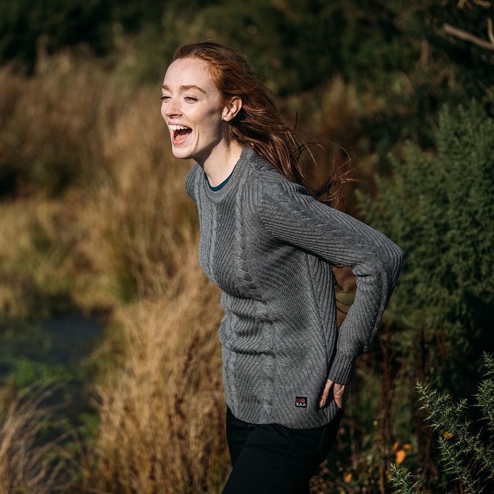 Isobaa | Womens Merino Cable Sweater (Charcoal) | Experience timeless style and outdoor-ready performance with our Merino wool crew neck sweater. | Model: Sophie