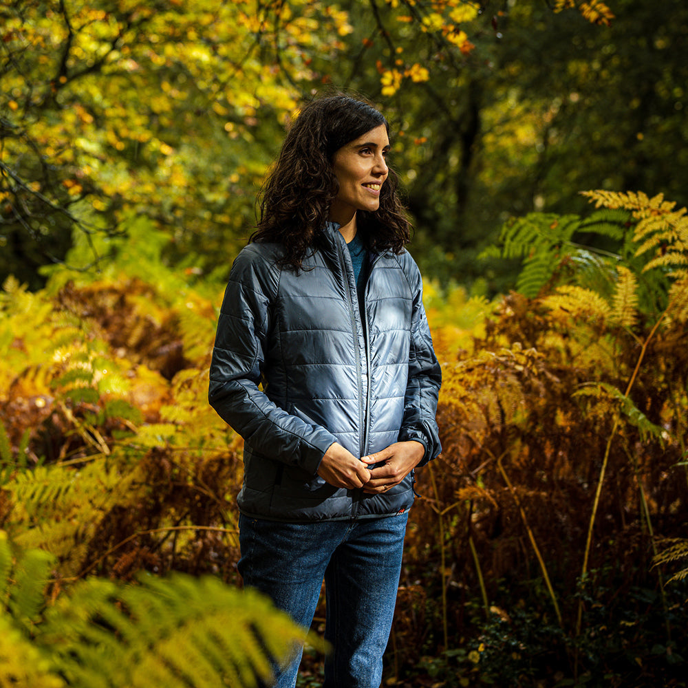 Isobaa | Womens Packable Insulated Jacket (Denim/Navy) | Exceptional warmth, packable convenience, and sustainable design with our lightweight Merino wool jacket. | Model: Clémentine
