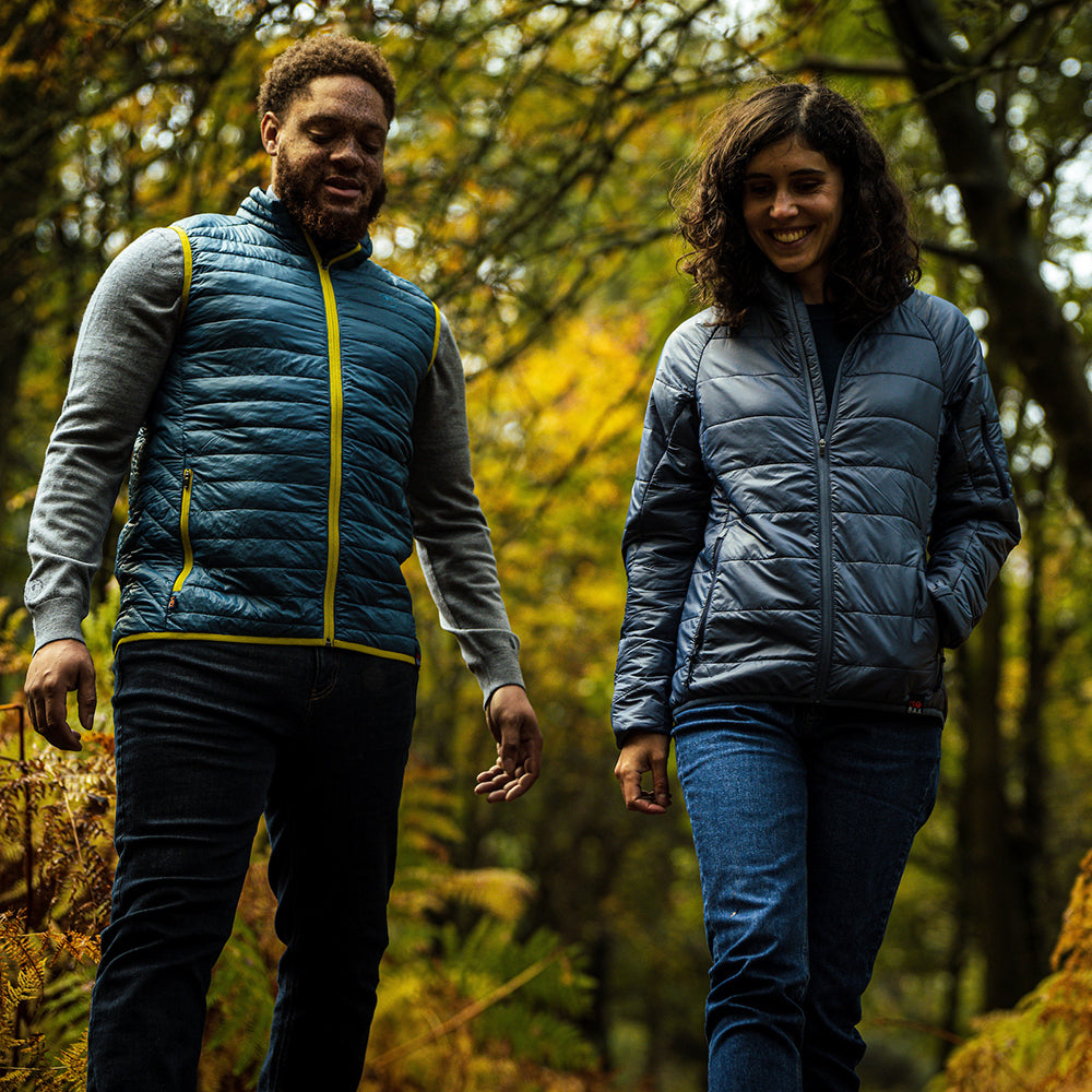 Isobaa | Womens Packable Insulated Jacket (Denim/Navy) | Exceptional warmth, packable convenience, and sustainable design with our lightweight Merino wool jacket. | Model: Clémentine
