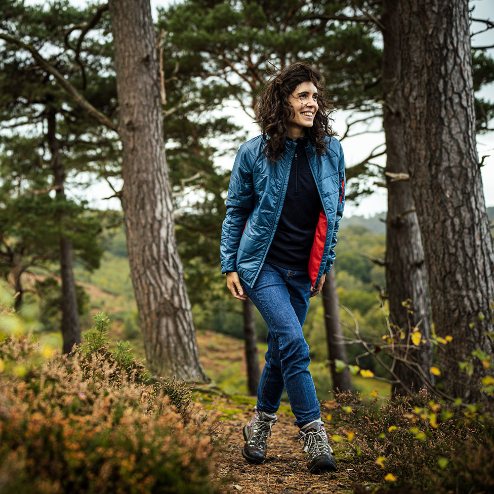 Isobaa | Womens Packable Insulated Jacket (Petrol/Orange) | Exceptional warmth, packable convenience, and sustainable design with our lightweight Merino wool jacket. | Model: Clémentine