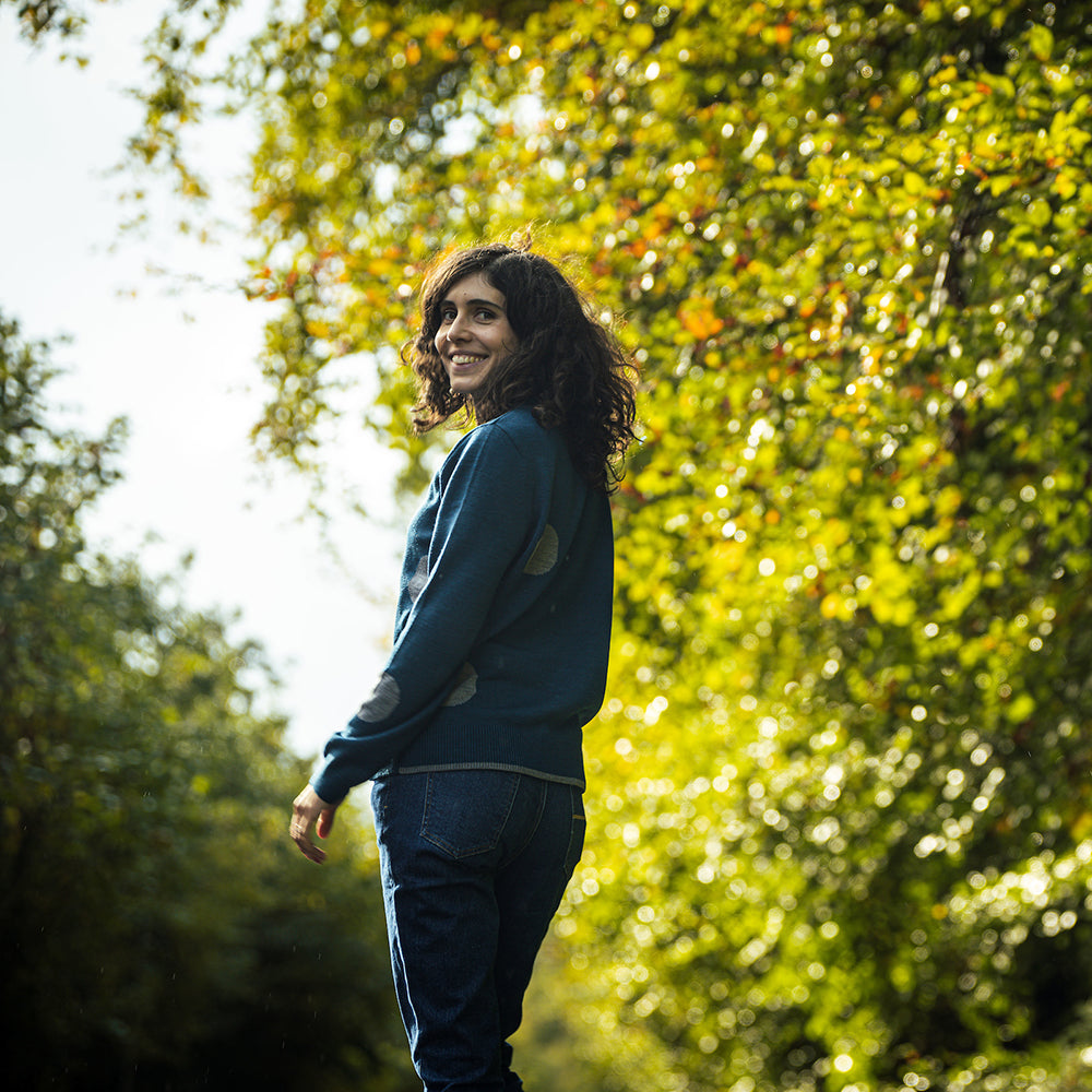 Isobaa | Womens Polka Dot Sweater (Petrol/Charcoal) | Discover the ultimate layering essential with Isobaa's extra-fine Merino crew neck sweater. | Model: Clémentine