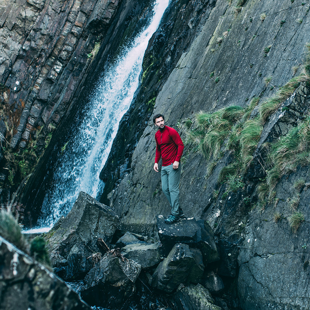 Isobaa | Mens Merino 200 Long Sleeve Zip Neck (Red) | Experience the best of 200gm Merino wool with this ultimate half-zip top – your go-to for challenging hikes, chilly bike commutes, post-workout layering, and unpredictable weather. | Model: Duncan