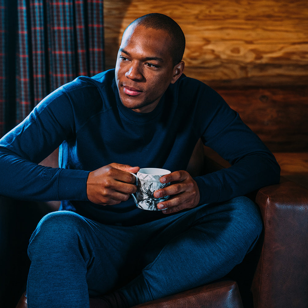 Isobaa | Mens Merino 260 Lounge Cuffed Joggers (Denim/Navy) | Discover unparalleled comfort and versatility with our luxurious 260gm Merino wool lounge joggers. | Model: Edirin