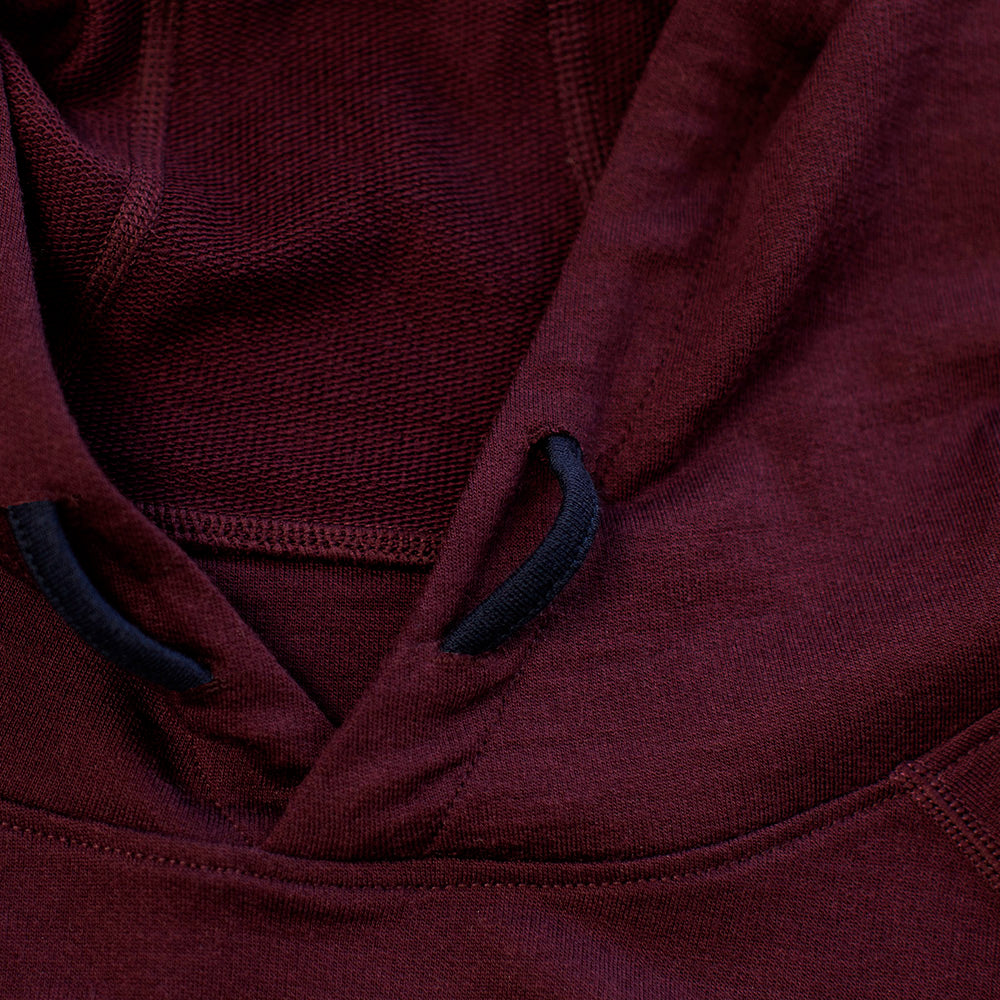 Isobaa | Mens Merino 260 Lounge Hoodie (Wine/Navy) | Experience the best in comfort and performance with our midweight 260gm Merino wool pullover hoodie.