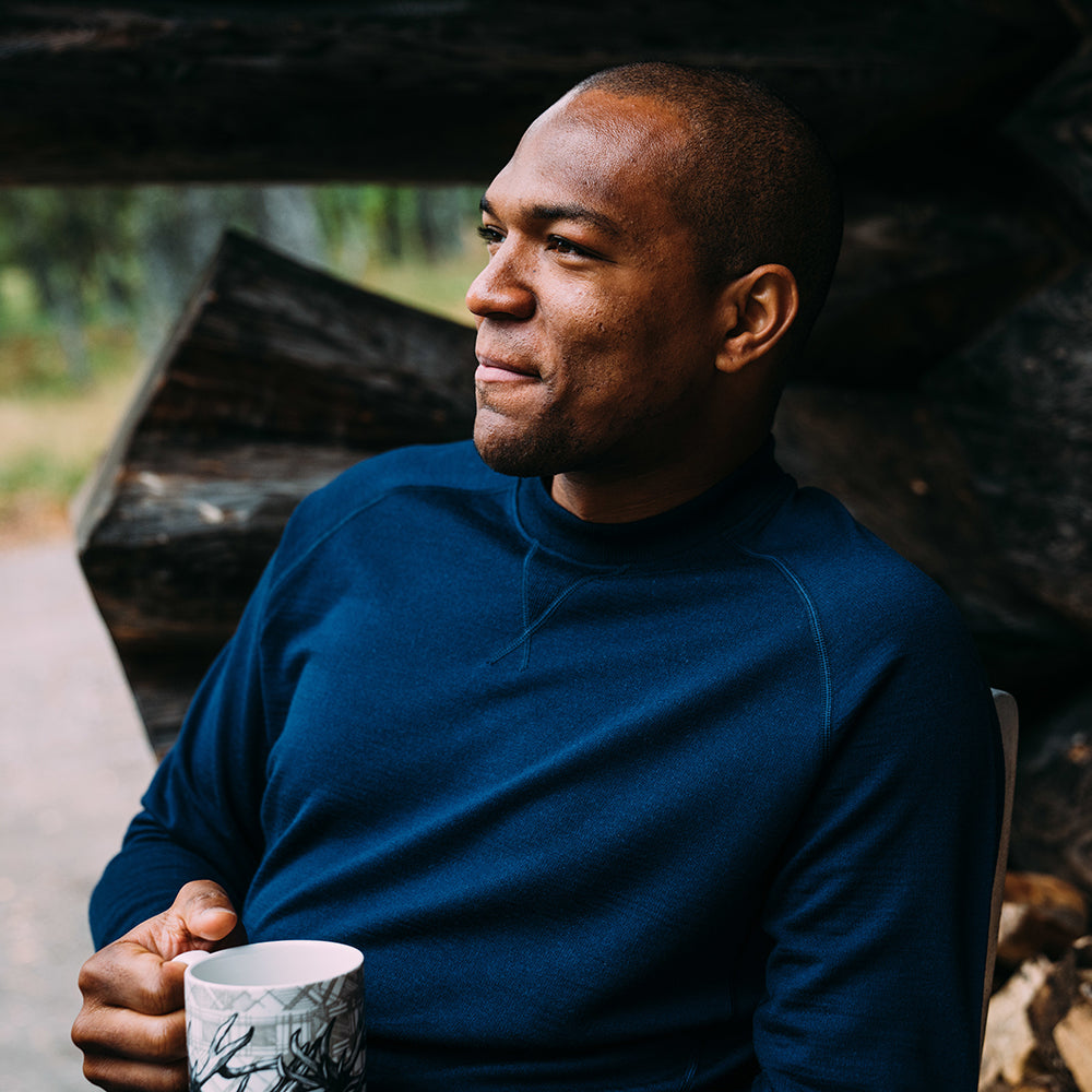 Isobaa | Mens Merino 260 Lounge Sweatshirt (Navy) | The ultimate 260gm Merino wool sweatshirt – Your go-to for staying cosy after chilly runs, conquering weekends in style, or whenever you crave warmth without bulk. | Model: Edirin