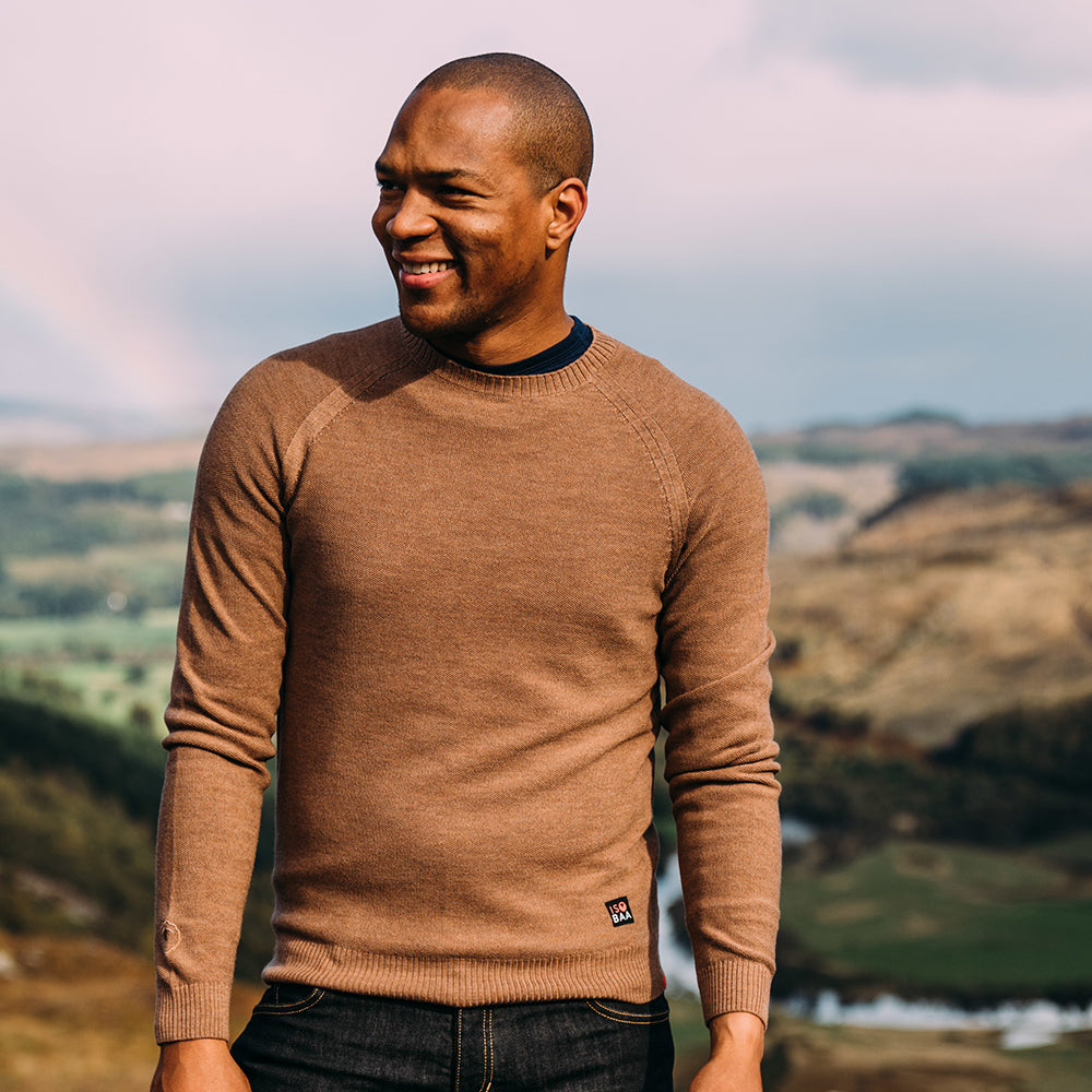 Isobaa | Mens Merino Moss Stitch Sweater (Bran/Orange) | Discover timeless style and outdoor-ready comfort with our extrafine Merino wool crew neck sweater. | Model: Edirin