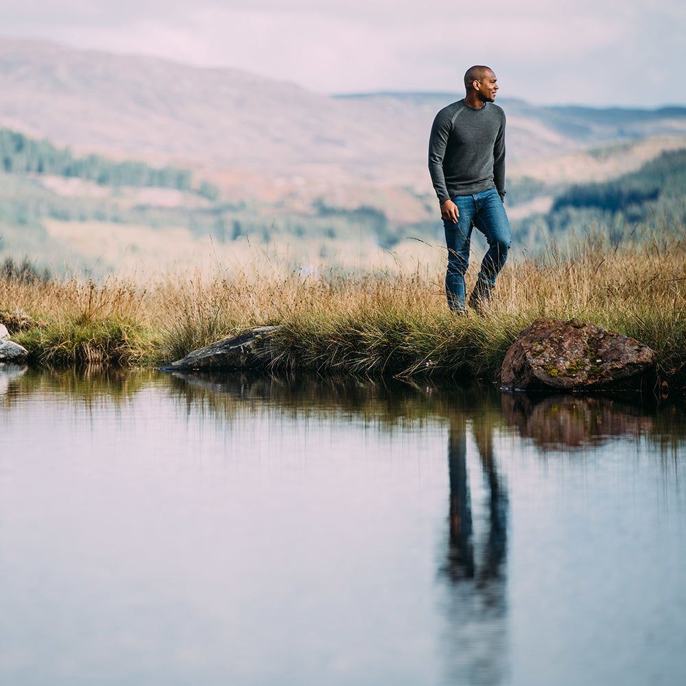 Isobaa | Mens Merino Moss Stitch Sweater (Smoke/Charcoal) | Discover timeless style and outdoor-ready comfort with our extrafine Merino wool crew neck sweater. | Model: Edirin