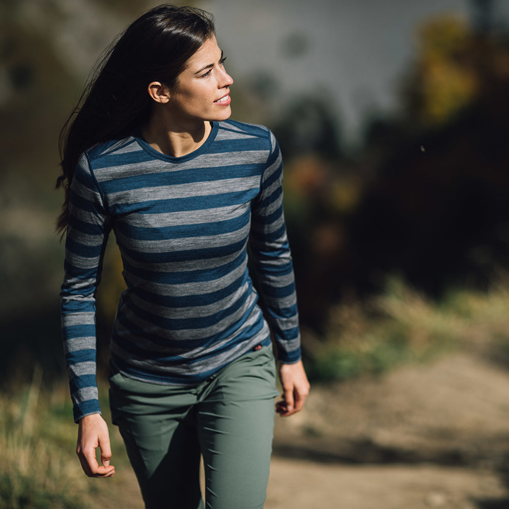 Isobaa | Womens Merino 180 Long Sleeve Crew (Denim/Charcoal) | Get outdoors with the ultimate Merino wool long-sleeve top. | Model: Jess