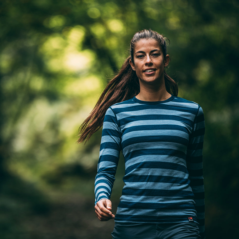 Isobaa | Womens Merino 180 Long Sleeve Crew (Petrol/Sky) | Get outdoors with the ultimate Merino wool long-sleeve top. | Model: Jess