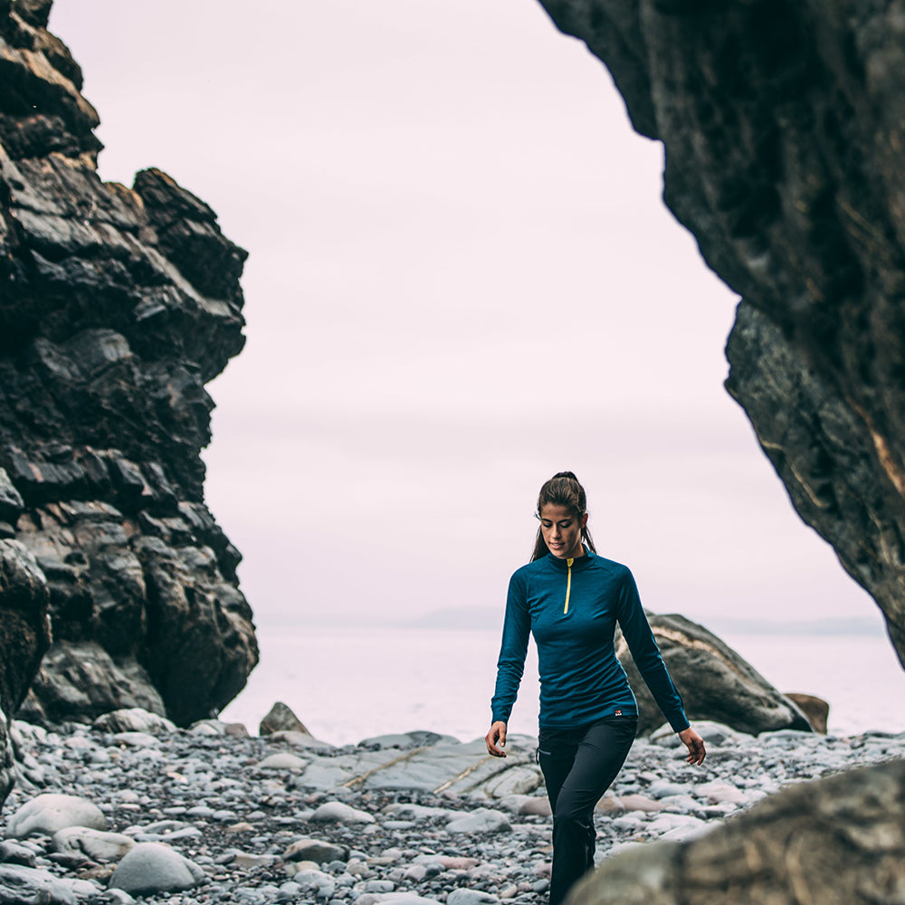 Isobaa | Womens Merino 200 Long Sleeve Zip Neck (Petrol) | Experience the best of 200gm Merino wool with this ultimate half-zip top – your go-to for challenging hikes, chilly bike commutes, post-workout layering, and unpredictable weather. | Model: Jess