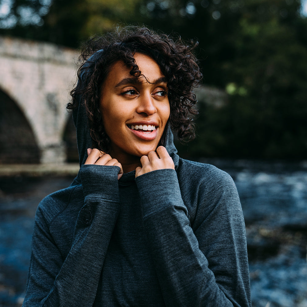 Isobaa | Womens Merino 260 Lounge Hoodie (Smoke/Black) | Experience the best in comfort and performance with our midweight 260gm Merino wool pullover hoodie. | Model: Micah