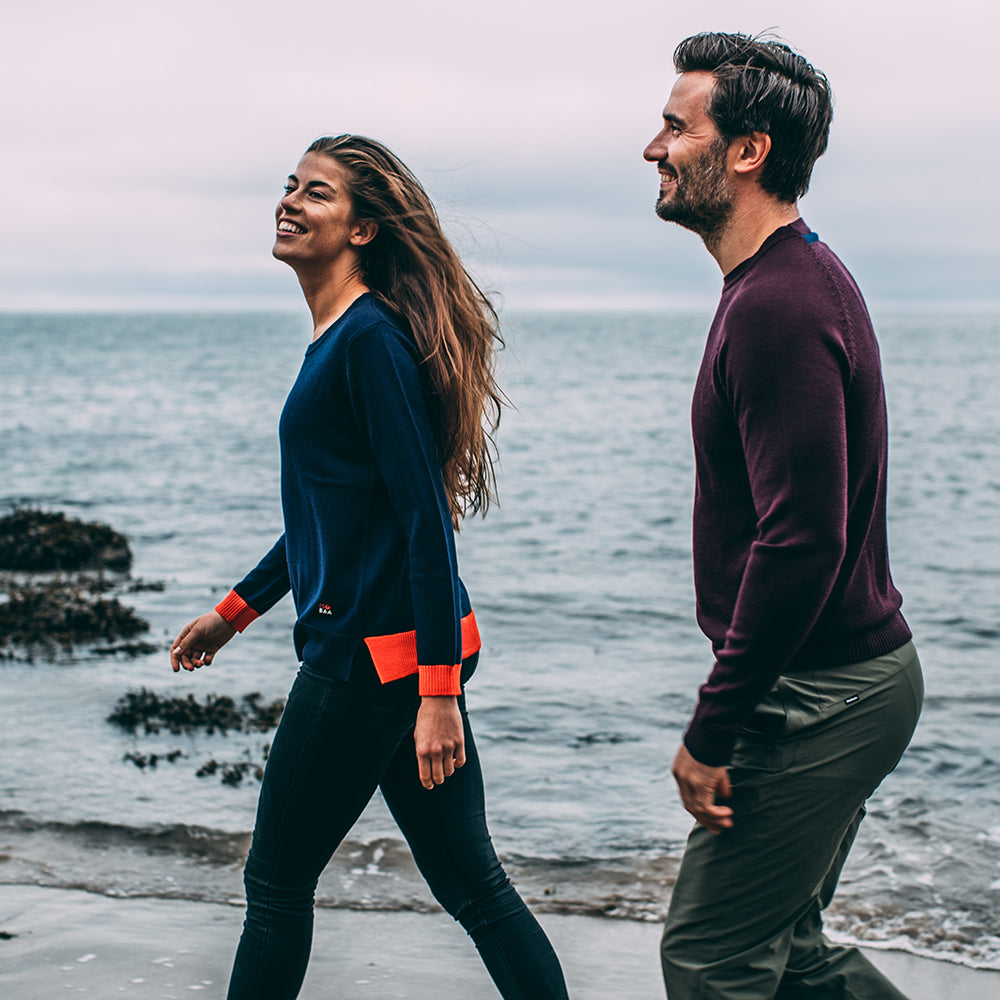 Isobaa | Womens Merino Crew Sweater (Navy/Orange) | Everyday warmth and comfort with our superfine 12-gauge Merino wool crew neck sweater. | Model: Jess