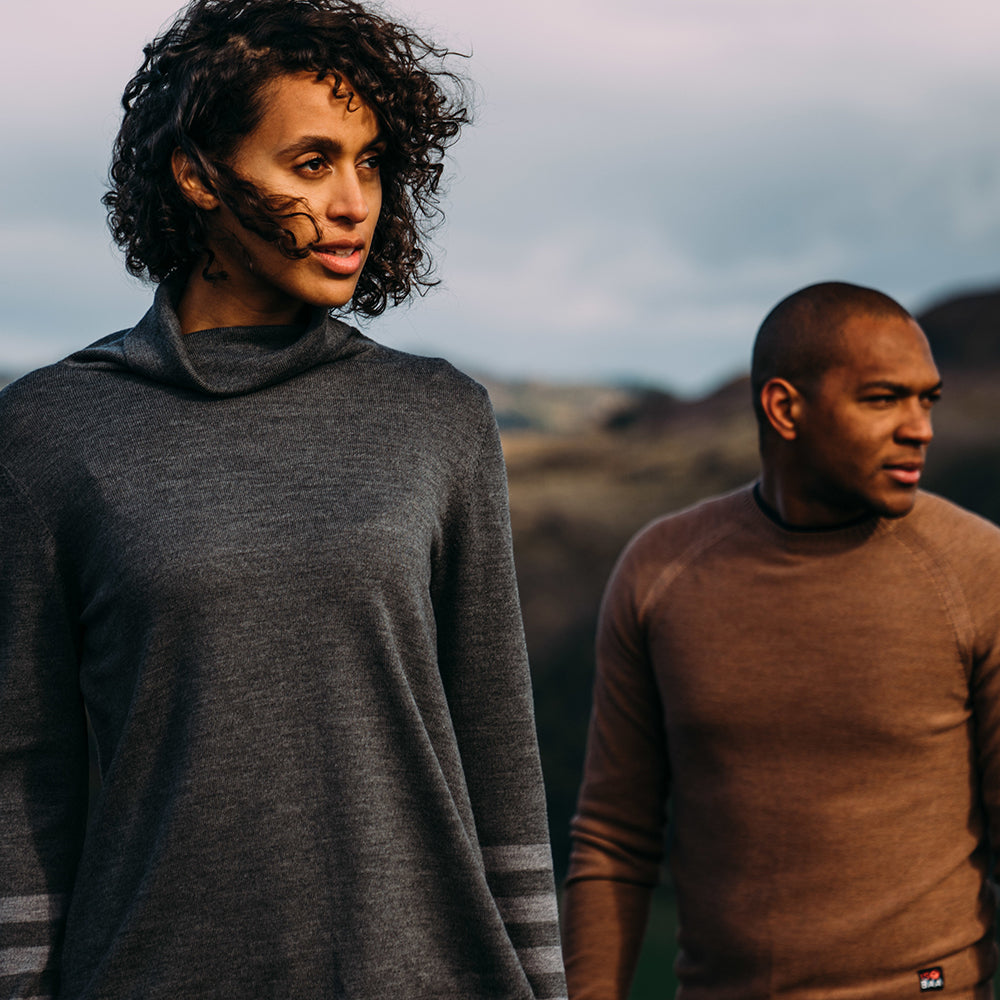 Isobaa | Womens Merino Roll Neck Sweater (Smoke/Charcoal) | Discover premium style and performance with Isobaa's extra-fine Merino roll neck sweater. | Model: Micah