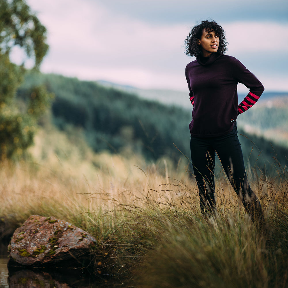 Isobaa | Womens Merino Roll Neck Sweater (Wine/Fuchsia) | Discover premium style and performance with Isobaa's extra-fine Merino roll neck sweater.