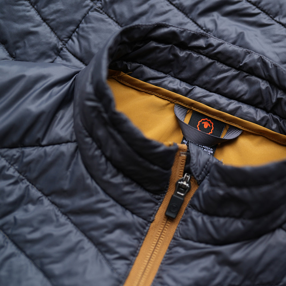 Isobaa | Womens Merino Wool Insulated Gilet (Smoke/Mustard) | Fight the chill with our innovative Merino gilet.