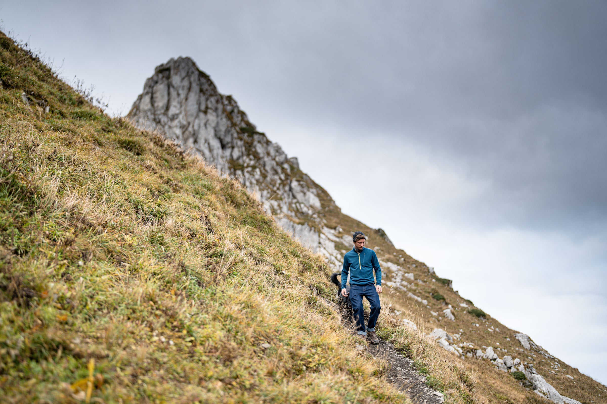Man hiking on a mountain trail
