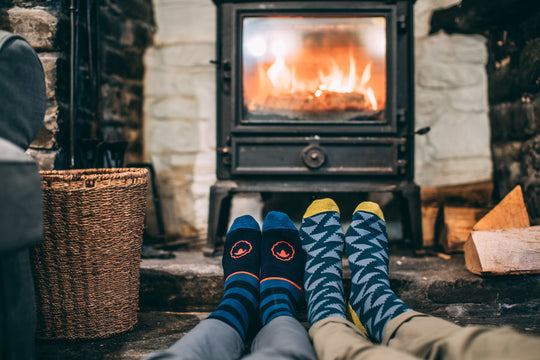 Isobaa Merino Blend Everyday Socks in front of a warm log burner