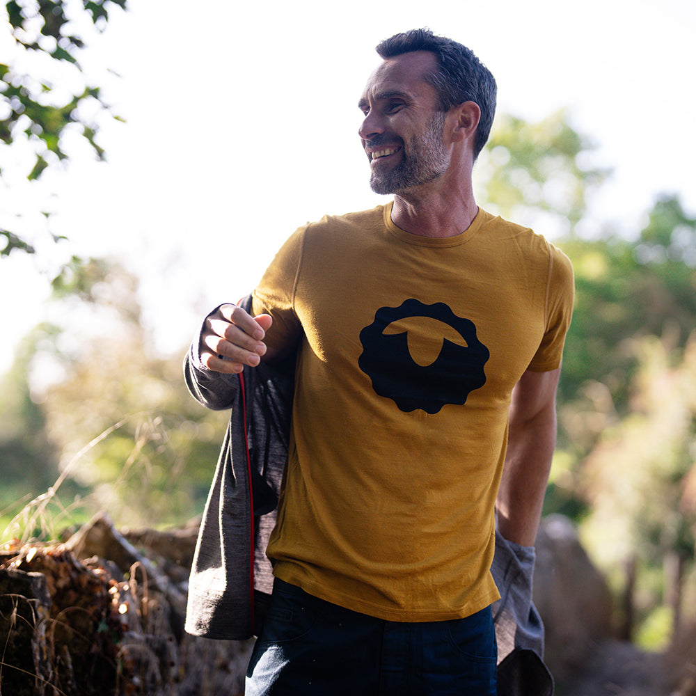 Isobaa | Mens Merino 150 Emblem Tee (Mustard/Navy) | Conquer trails and city streets in comfort with Isobaa's superfine Merino T-Shirt.