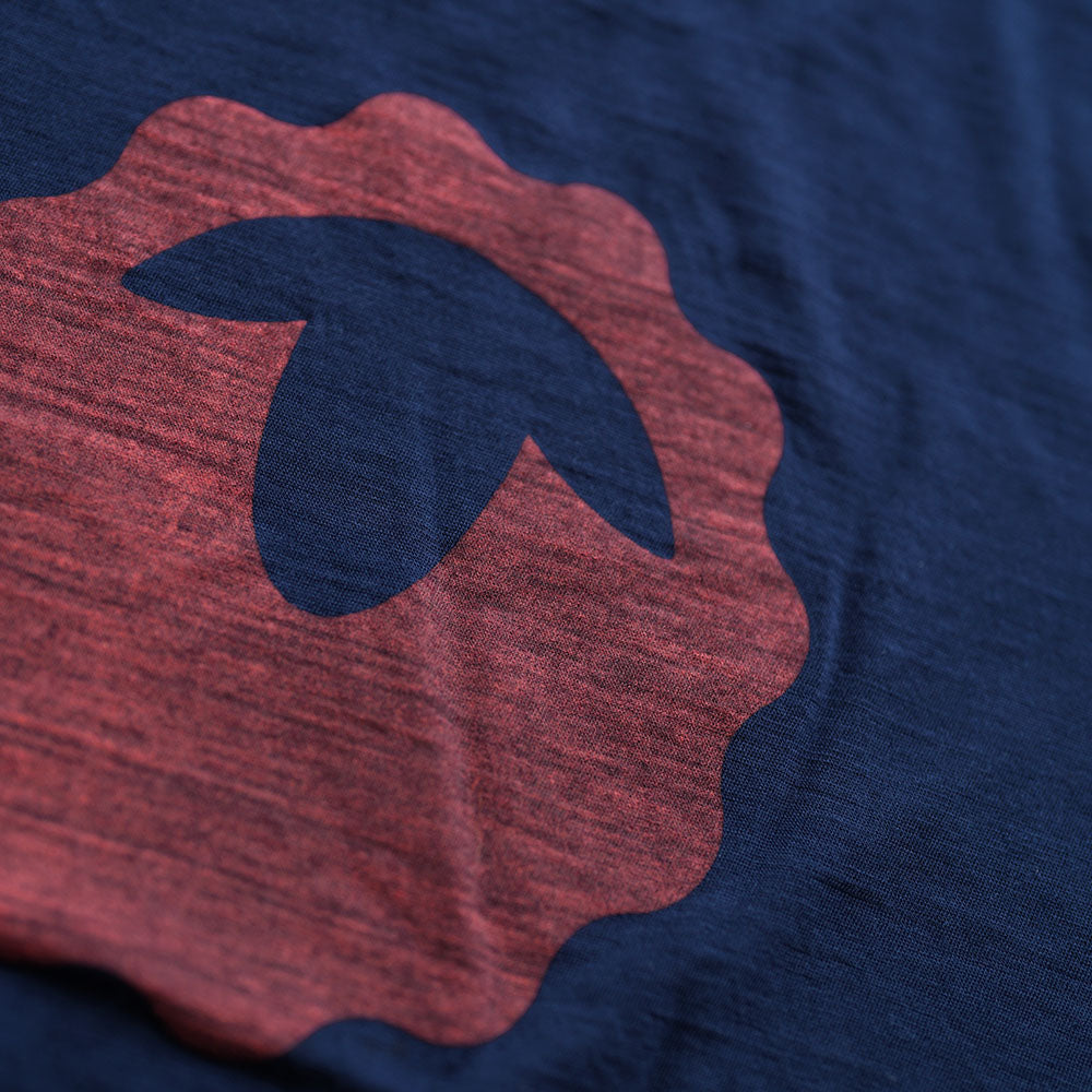 Isobaa | Mens Merino 150 Emblem Tee (Navy/Orange) | Conquer trails and city streets in comfort with Isobaa's superfine Merino T-Shirt.