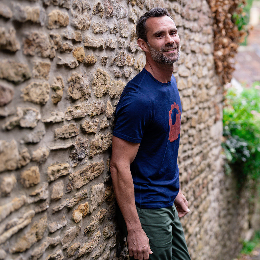 Isobaa | Mens Merino 150 Emblem Tee (Navy/Orange) | Conquer trails and city streets in comfort with Isobaa's superfine Merino T-Shirt.