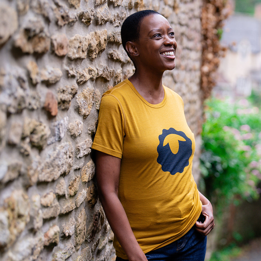 Isobaa | Womens Merino 150 Emblem Tee (Mustard/Navy) | Conquer trails and city streets in comfort with Isobaa's superfine Merino T-Shirt.