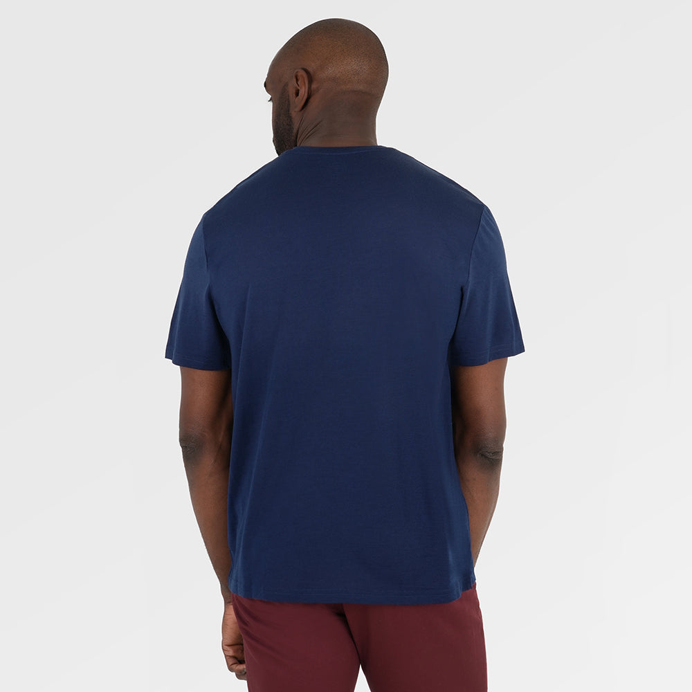Mens Merino 150 Emblem Relaxed Tee (Navy/Sky) | Model: Michael