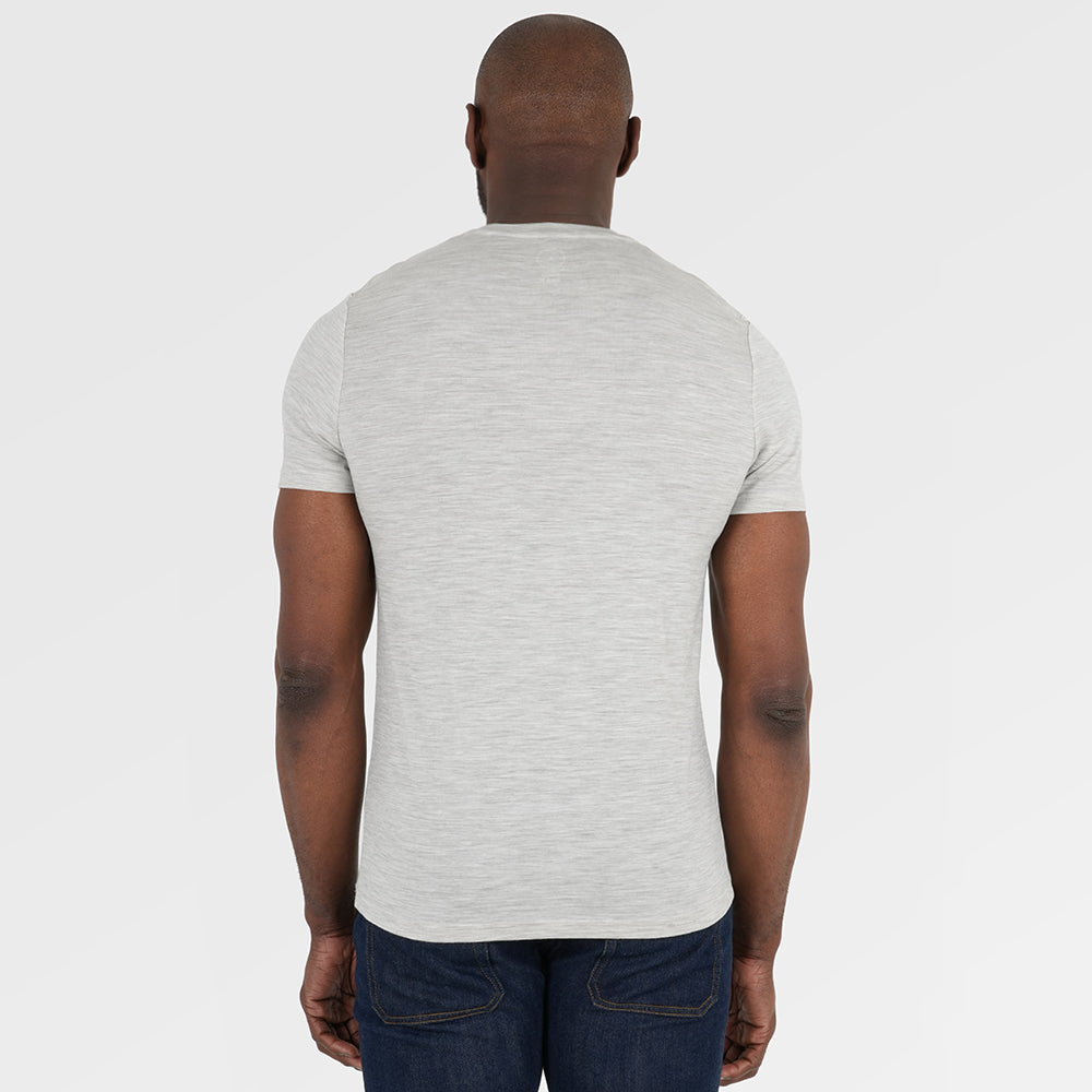 Mens Merino 150 Sketched Sunset Tee (Jute/Denim) | Model: Michael