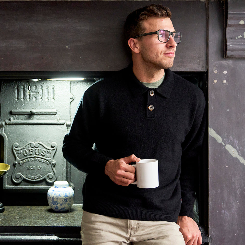 Mens Solace Merino Polo Sweater (Black) | Model: James