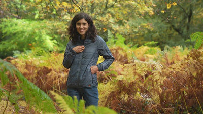 Isobaa | Womens Packable Insulated Jacket (Denim/Navy) | Exceptional warmth, packable convenience, and sustainable design with our lightweight Merino wool jacket. | align: 50% 45% | Model: Clémentine
