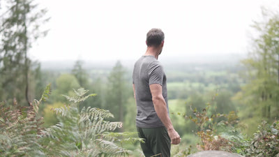 Isobaa | Mens Merino 150 Sheep Tee (Smoke/Black) | Gear up for everyday adventures in Isobaa's superfine Merino Tee. | align: 65% 50% | Model: Ben