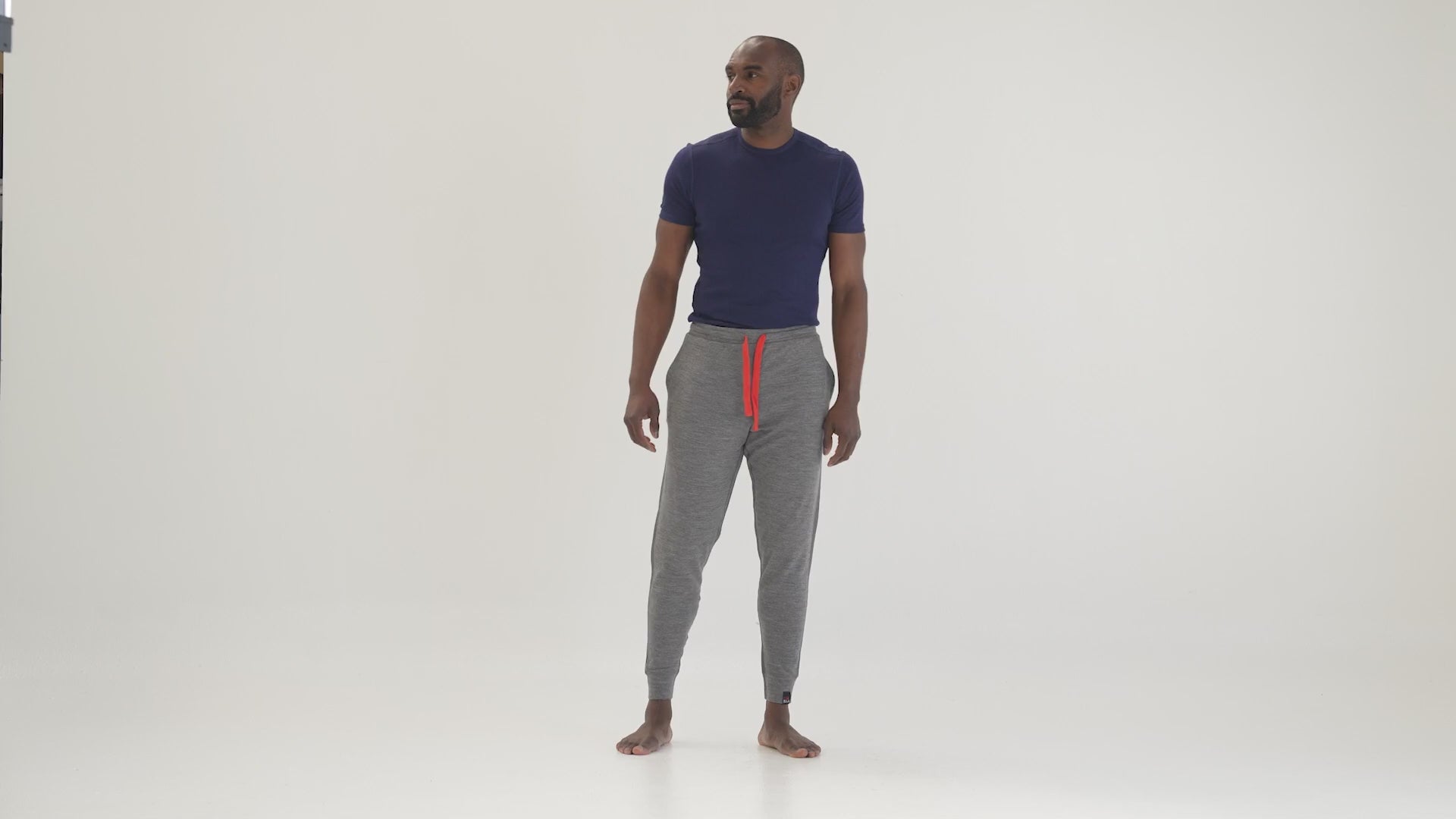 Mens Merino 260 Lounge Cuffed Joggers (Charcoal/Orange) | Model: Michael