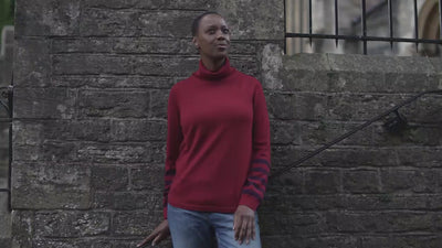 Isobaa | Womens Merino Roll Neck Sweater (Red/Wine) | Discover premium style and performance with Isobaa's extra-fine Merino roll neck sweater. | align: 45% 50% | Model: Yolisa